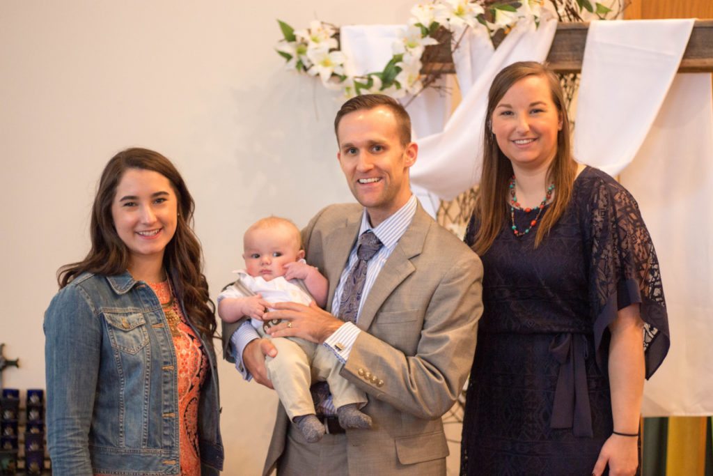 For guys, when in doubt, opt for a suit to wear to baptism