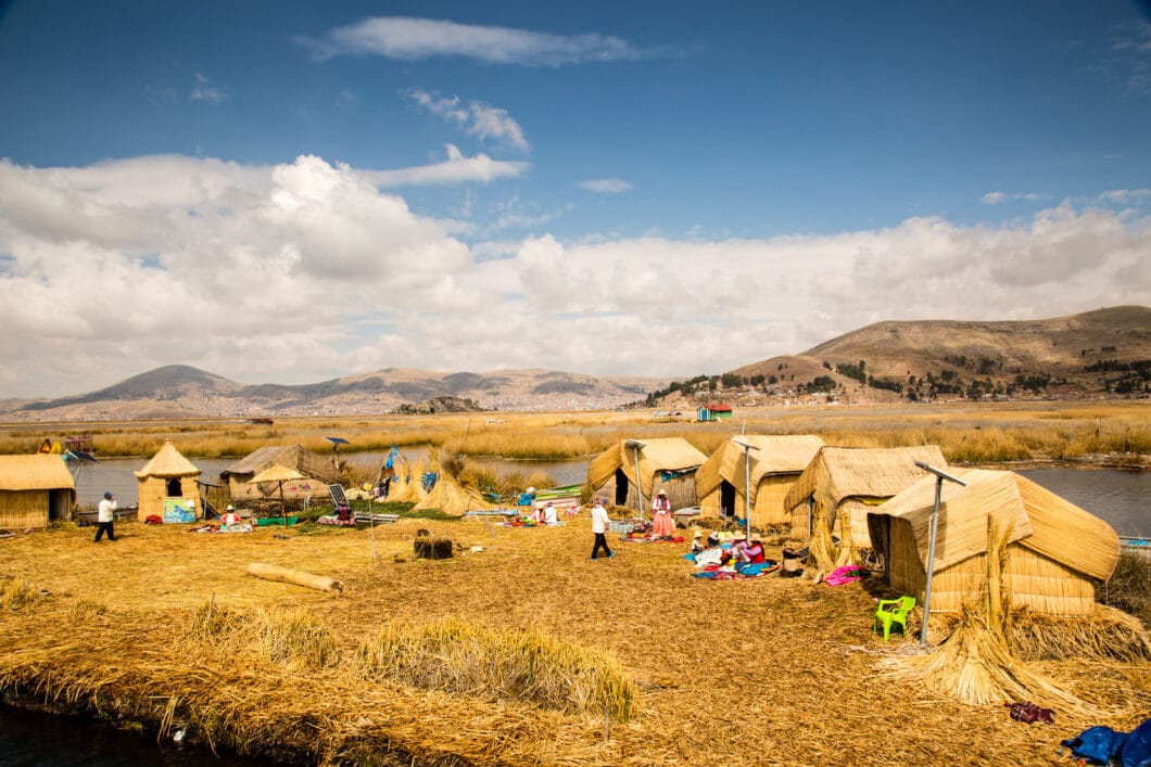 A group of huts on the shore of Islas Uros.