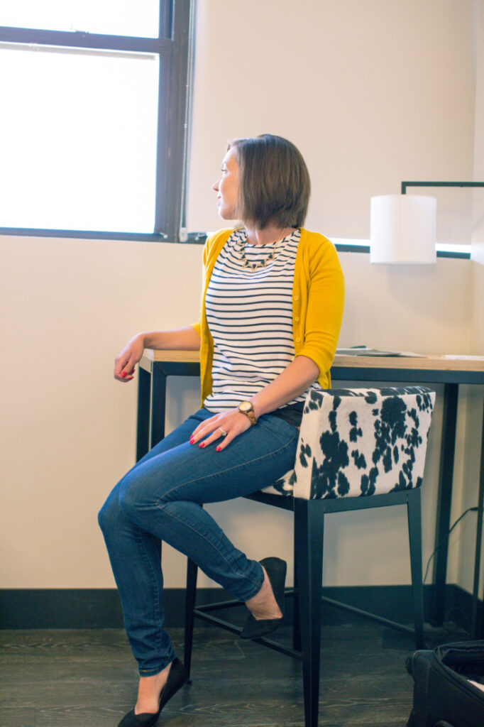 black and white outfit with yellow cardigan