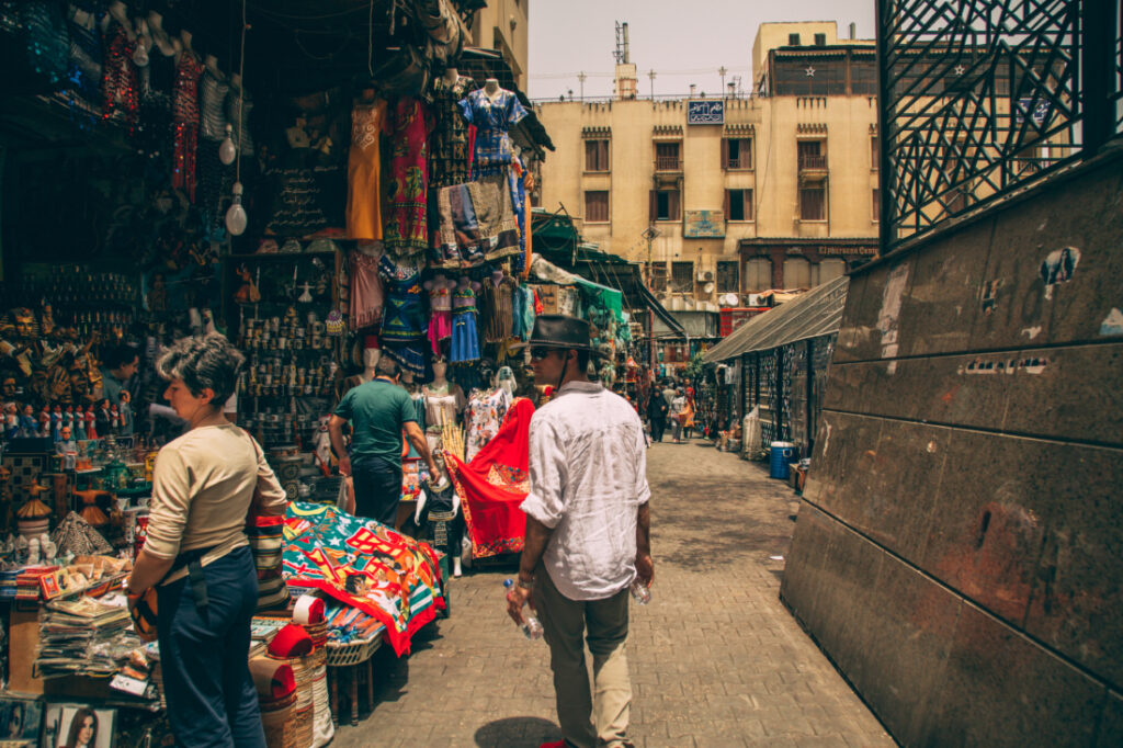 Shoppers stop at one of the stalls at the Khan El Khalili Bazaar, filled with items for sale.