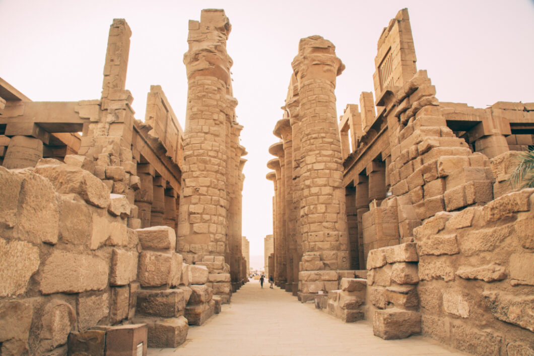 Entrance to Karnak Temple in Luxor Egypt featuring several large columns and blocks