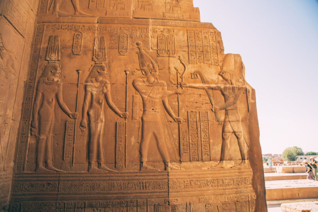 Drawings and hieroglyphics on the wall of the temple of Kom Ombo, Egypt