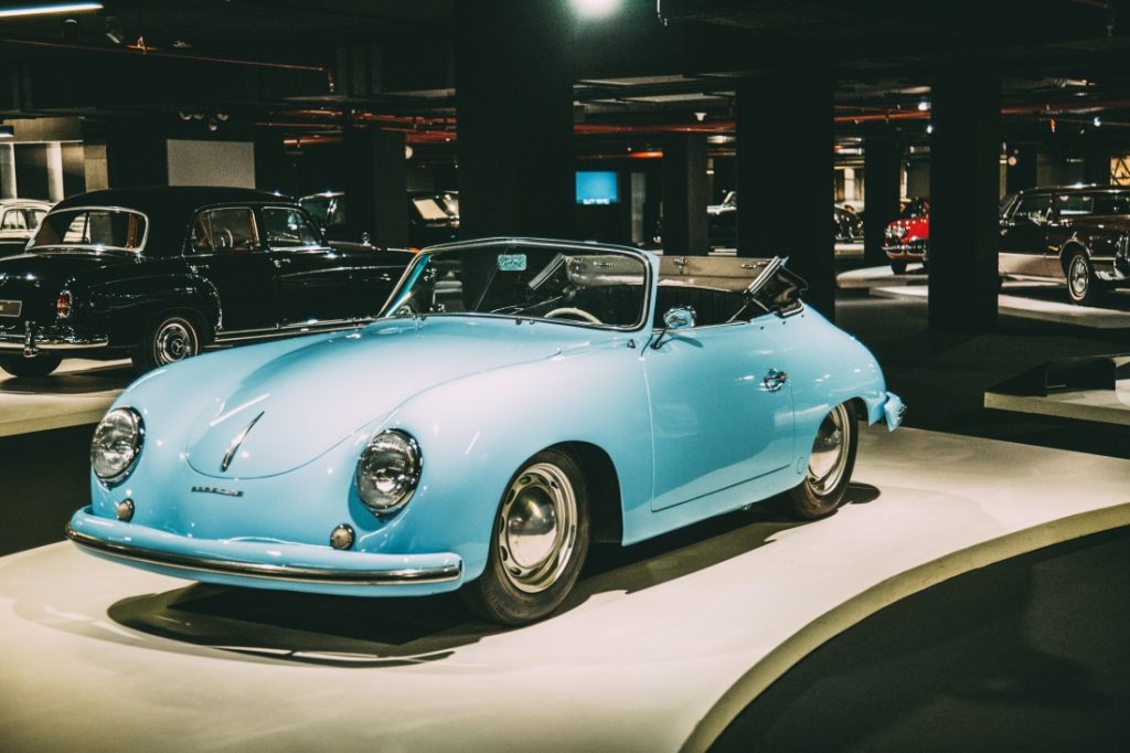 A 1950s style baby blue Porsche 356 on display at the Heydar Aliyev Center's Classic Car Exhibit in Baku.