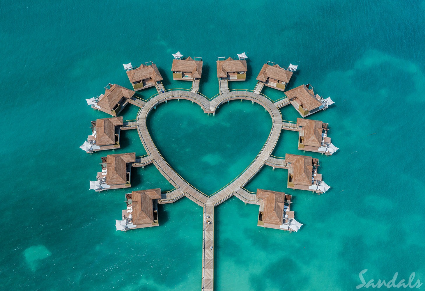 Sandals South Coast Whitehouse Jamaica overwater bungalows luxury resort in the Caribbean in the shape of a heart