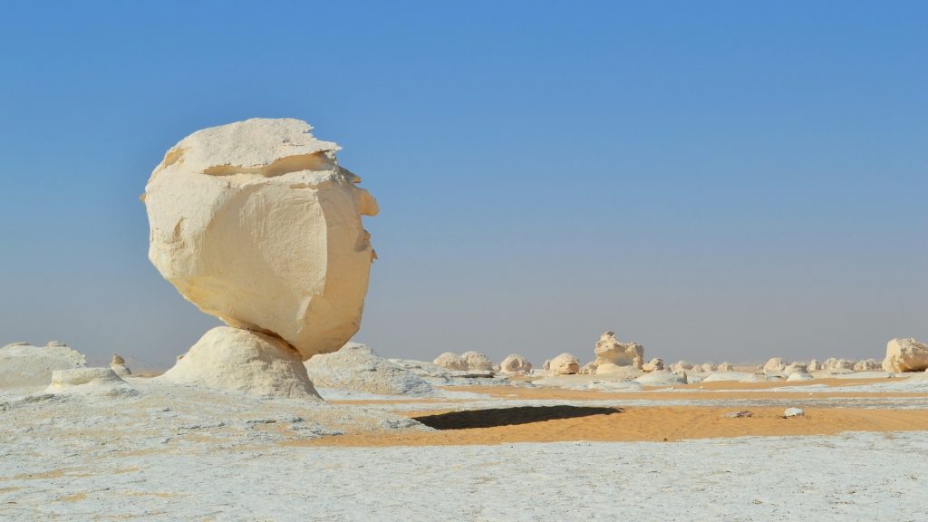 A massive natural rock formation in the White Desert in Farafrat, Egypt.