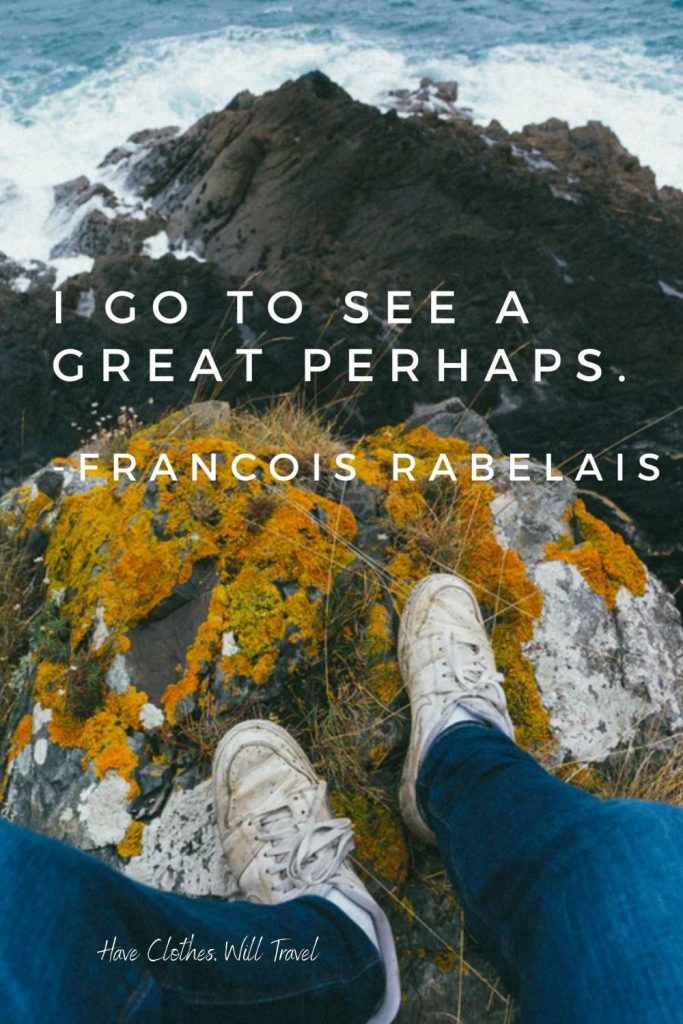 An image of a rocky shoreline, looking down off moss-covered cliff. A pair of feet rests on the rocks. White text over the image says, "I go to see a great perhaps. - Francois Rabelais"