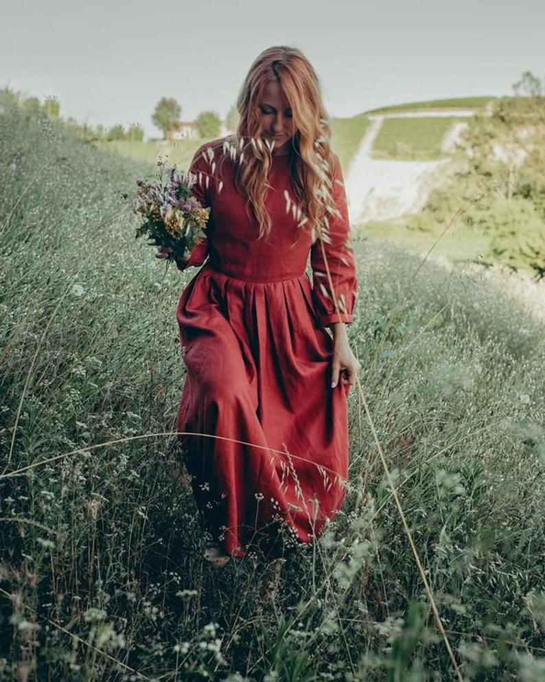 Model Wearing a Cottagecore Dress in Orange