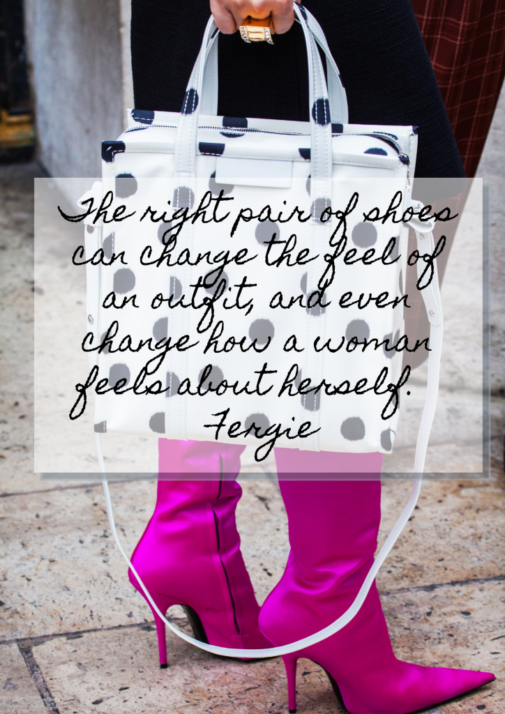 A woman holds a white purse covered with black polkadots, and wears bright pink high-legged stiletto boots. Black cursive text over the image reads, "The right pair of shoes can change the feel of an outfit, and even change how a woman feels about herself. – Fergie"