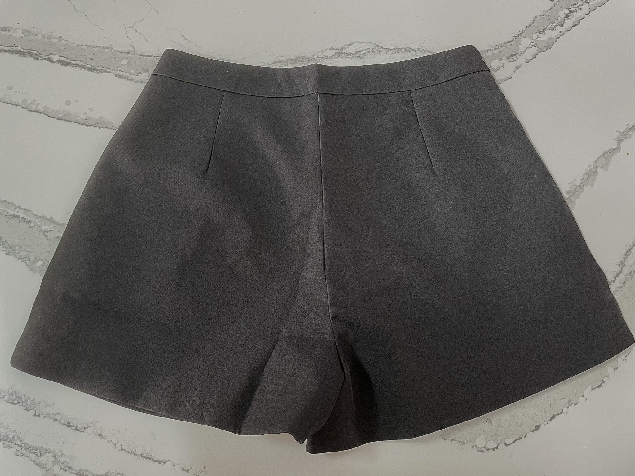 Horsebit Side Pockets Shorts in Black from Chicwish.