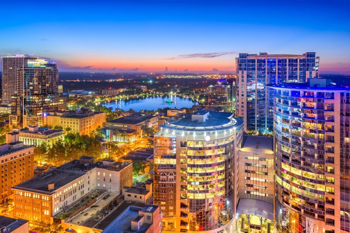 Orlando, Florida, USA aerial cityscape towards Eola Lake.