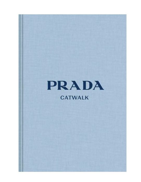 Hardcover fashion and designer book titled Prada: The Complete Collections - Catwalk by Susannah Frankel (Contributor) with a light blue book cover design