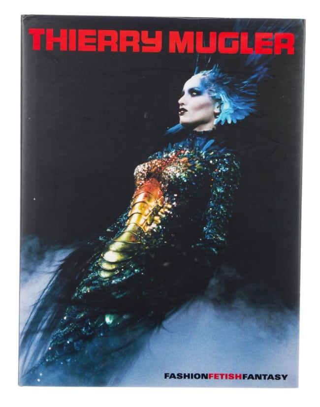 Hardcover fashion and designer book authored by Thierry Mugler titled Fashion Fetish Fantasy with book cover design of a goth-inspired mermaid