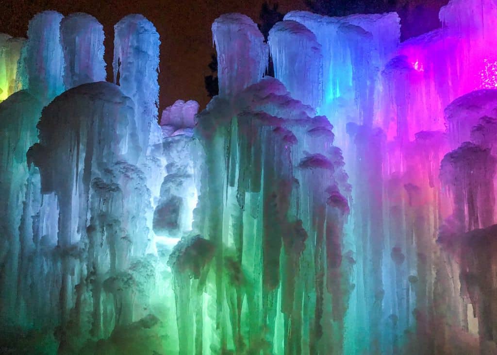 Lake geneva ice castles lit up at night