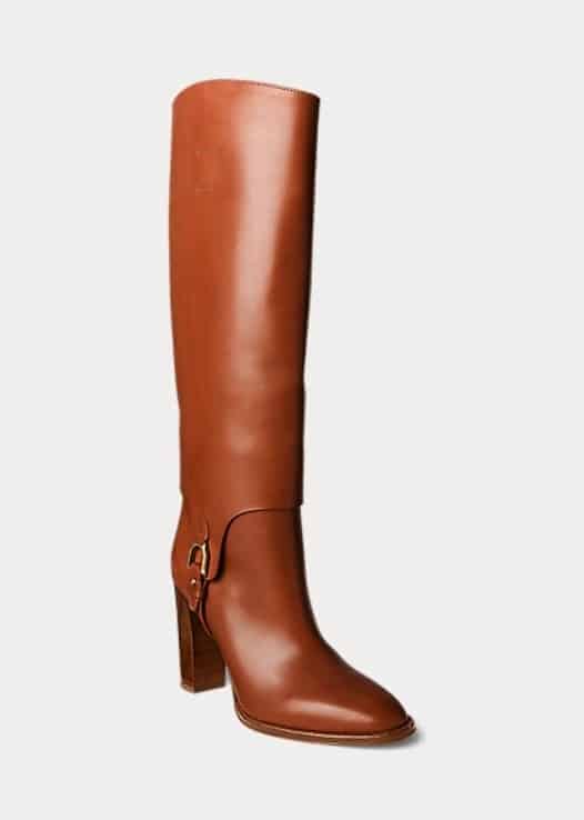 A woman's brown leather knee high boot.