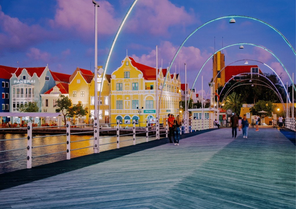 The Queen Emma Pontoon Bridge at sunset.