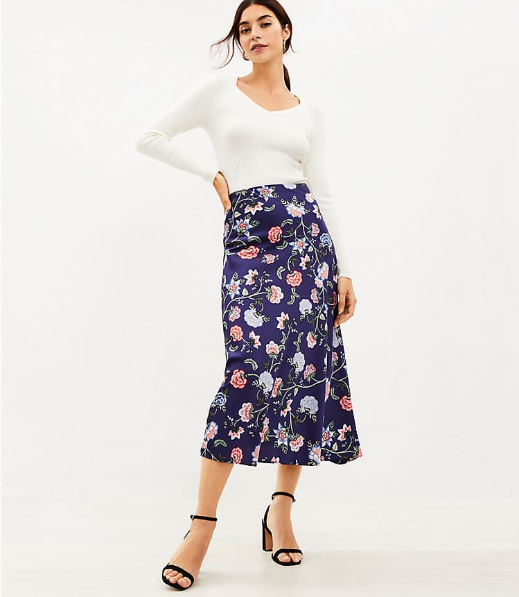 White top paired with a floral midi skirt from Loft