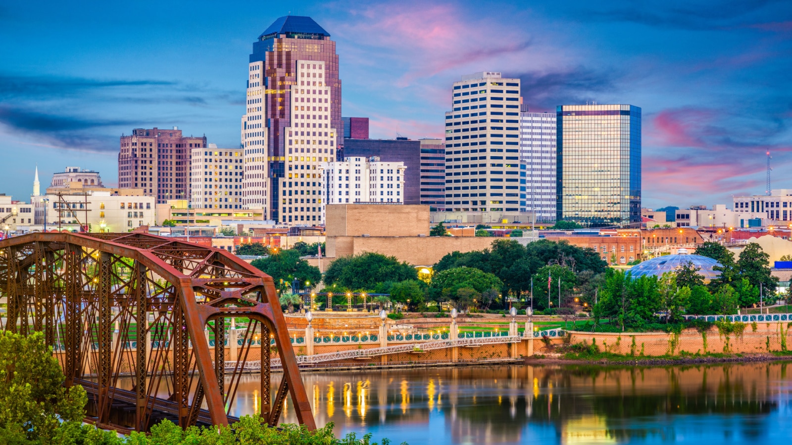 Shreveport, Louisiana, USA skyline over the Red River at dusk