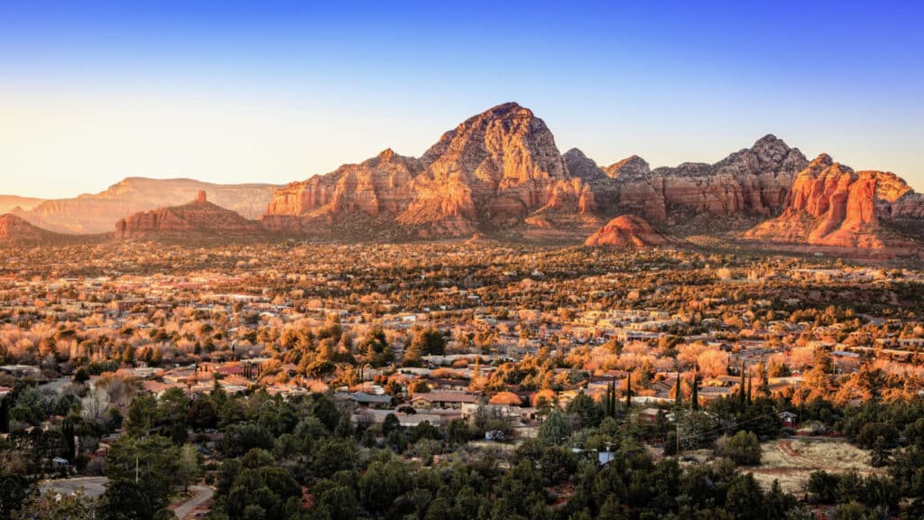 Birds eye view to the city of Sedona, Arizona and the Red Rocks at sunset