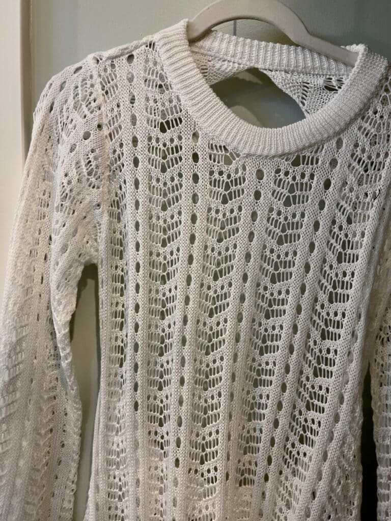 Open back hollow out knit cover up in white from Chicwish.