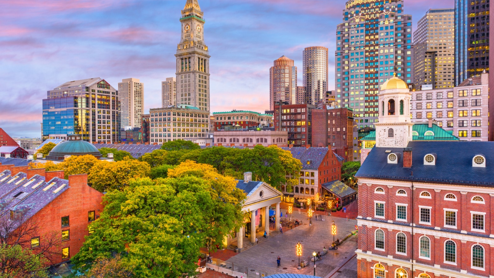 Boston, Massachusetts, USA skyline with Faneuil Hall and Quincy Market at dusk.