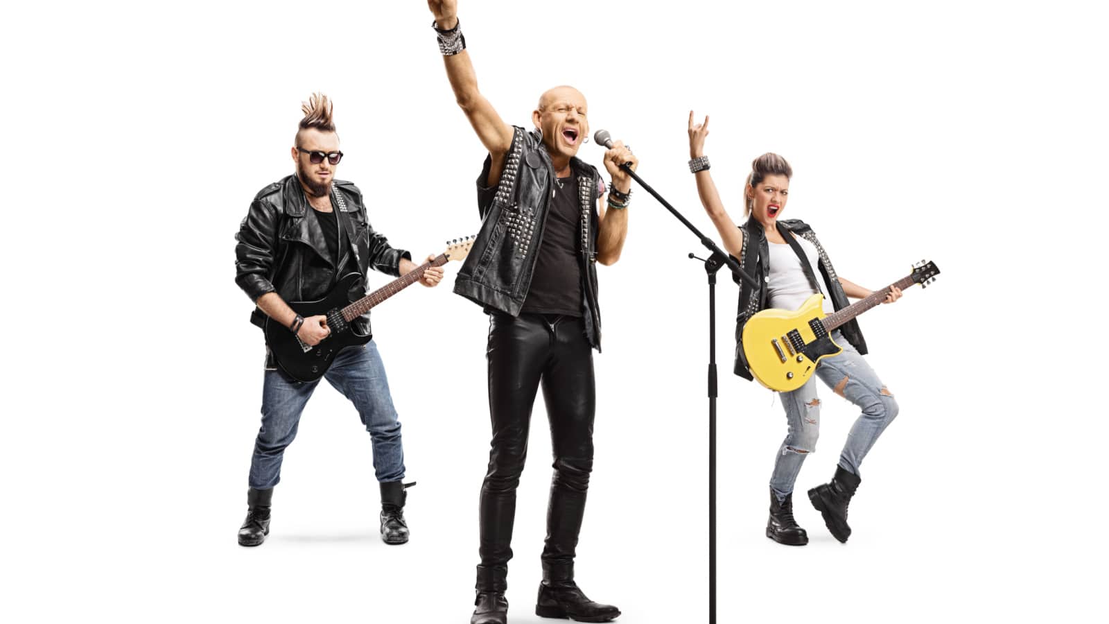 Full length portrait of a male rock star singing on a microphone and male and female musicians playing guitars isolated on white background