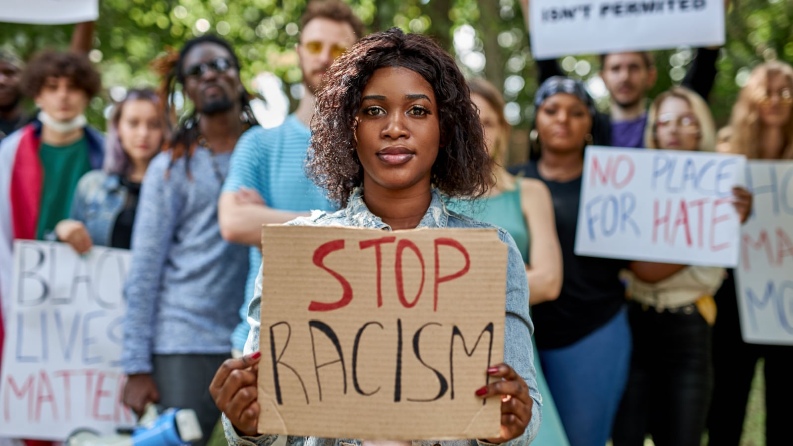 diverse american people took to the public park and streets to protest anti-black racism and police brutality. black lives matter, blm concept