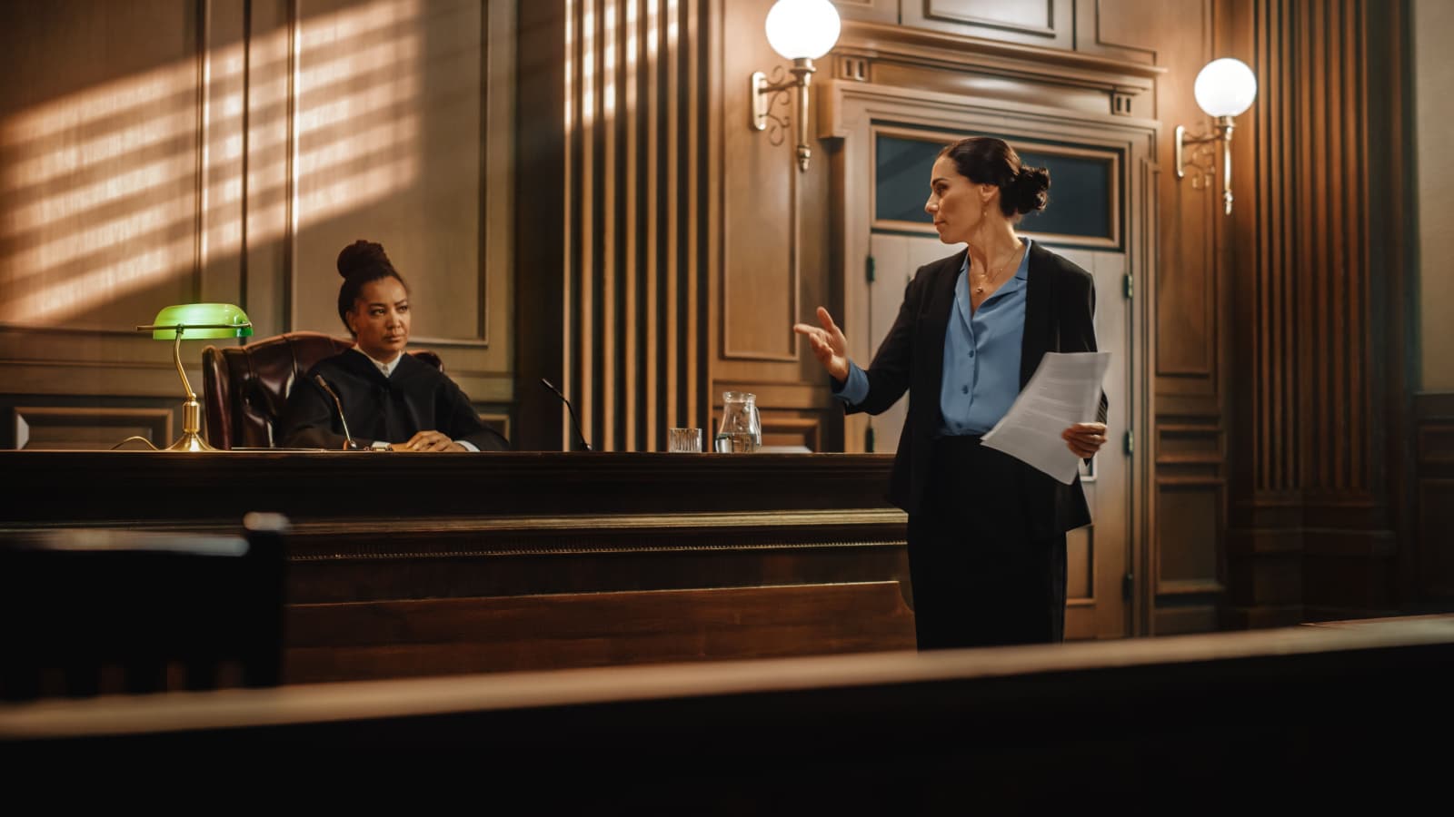 Court of Justice and Law Trial: Successful Female Public Defender Presenting the Case, Making Passionate Speech to Judge, Jury. Attorney Lawyer Protecting Client with Closing Not Guilty Arguments.