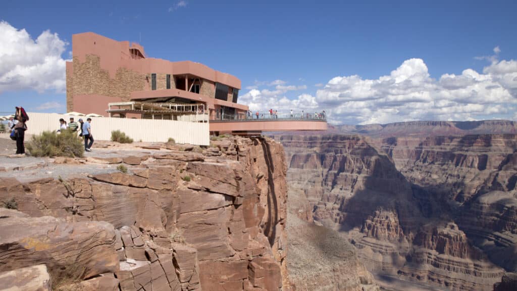 Grand Canyon, Arizona, USA - September 21, 2014: Tourist enjoying the view of the west rim of The Grand Canyon from the Skywalk at Grand Canyon, Arizona, USA on September 21, 2014