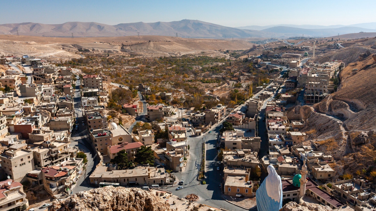 Village Maaloula in Syria with a statue of the Virgin Mary Syria before the war November 30, 2010. Maaloula is a Christian village where the language spoken by Jesus Christ has been preserved Aramaic