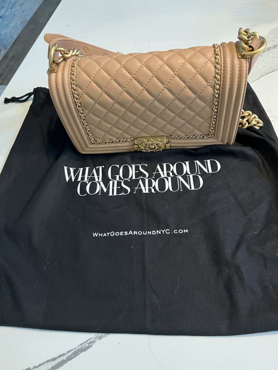 What Goes Around Comes Around dust cover and Chanel Boy Bag