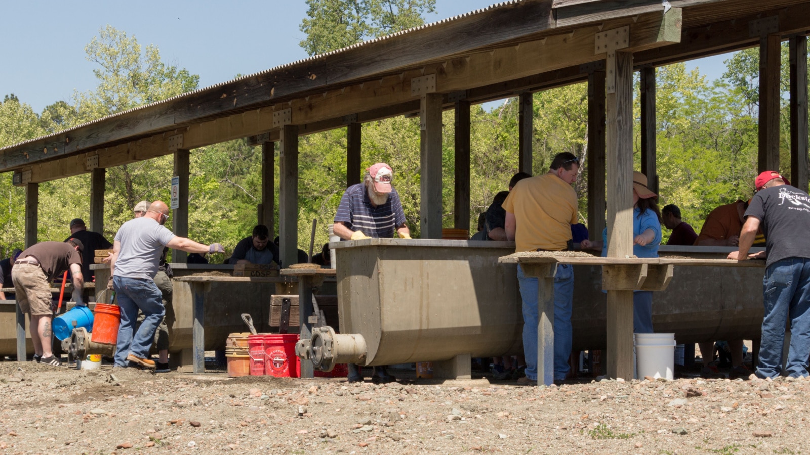 Murfreesboro, Arkansas / USA - April 27, 2018: Diamond hunting at Crater of Diamonds State Park. Many people wet sift dirt looking for diamonds and gems