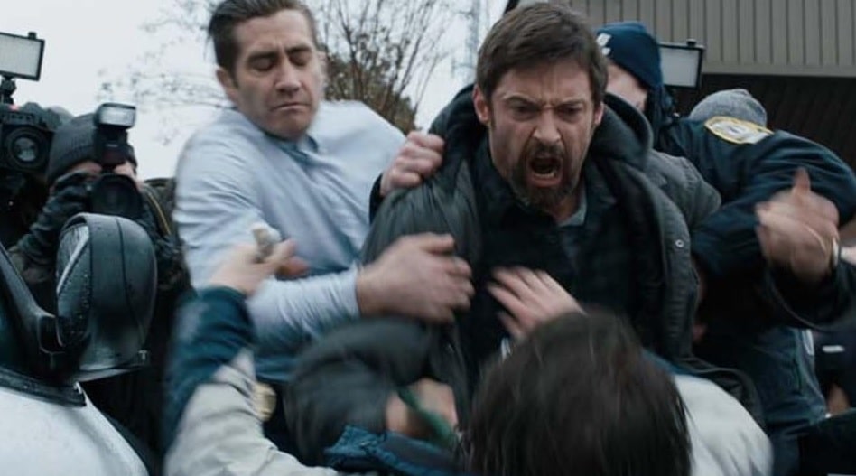 Jake Gyllenhaal and Hugh Jackman in Prisoners (2013)