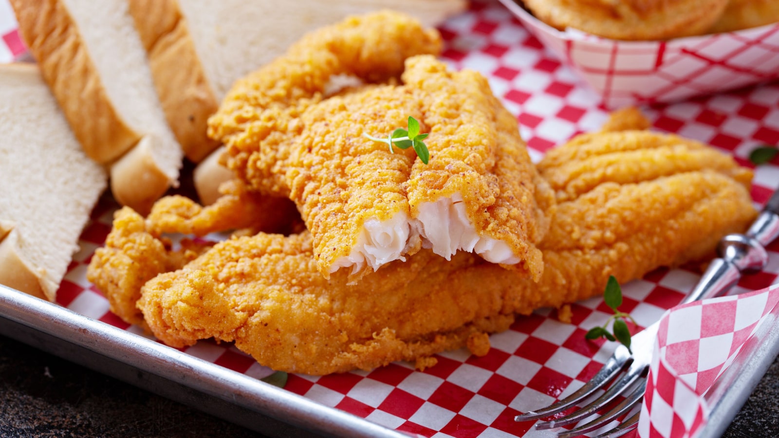 Fried catfish with cornbread dipped with buttermilk and seasoned with cornmeal, southern tradition