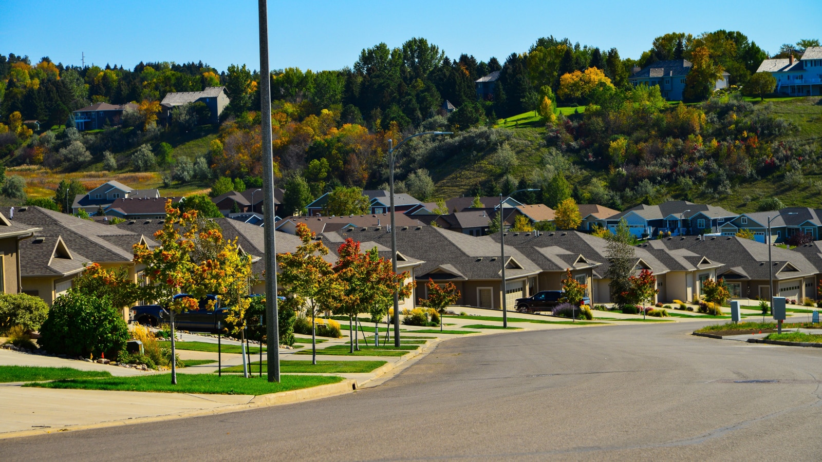 Modern homes line the streets of this comfortable neighborhood in growing Bismarck, North Dakota.