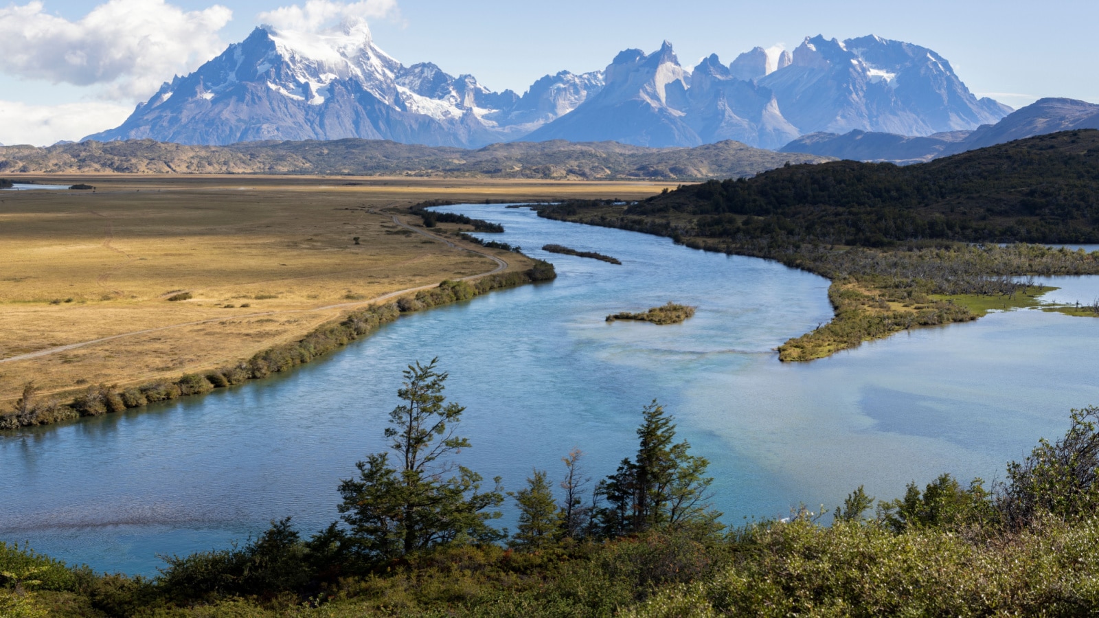 Serrano River and snowy mountains of Torres del Paine National Park in Chile, Patagonia, South America