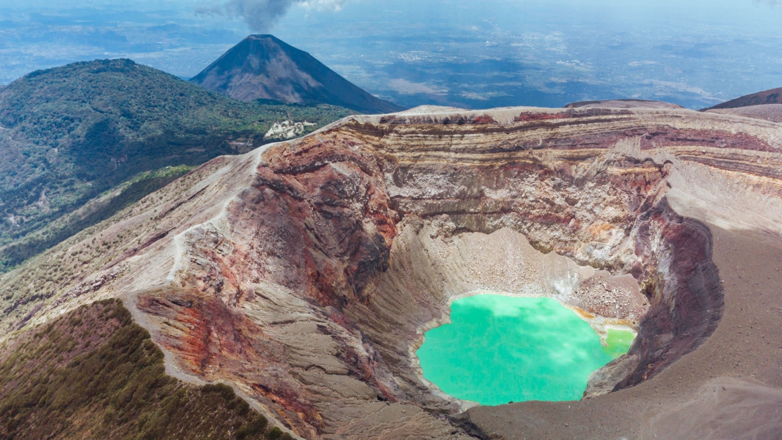 Drone shot showing crater lake at Santa Ana Volcano in the central american country of El Salvador.