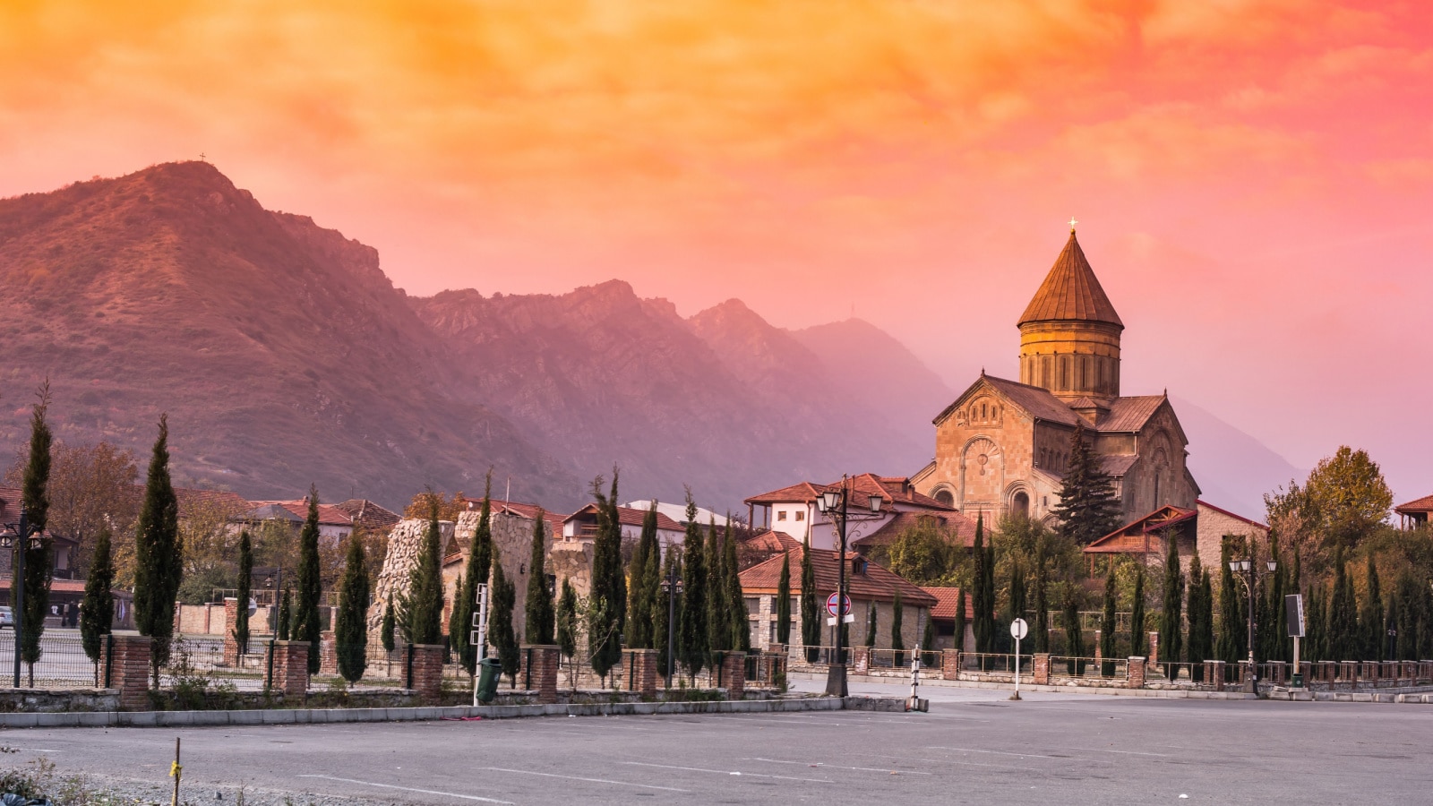 amazing sunset view of Svetitskhoveli Cathedral and mountains in sunset, Mtskheta, Georgia