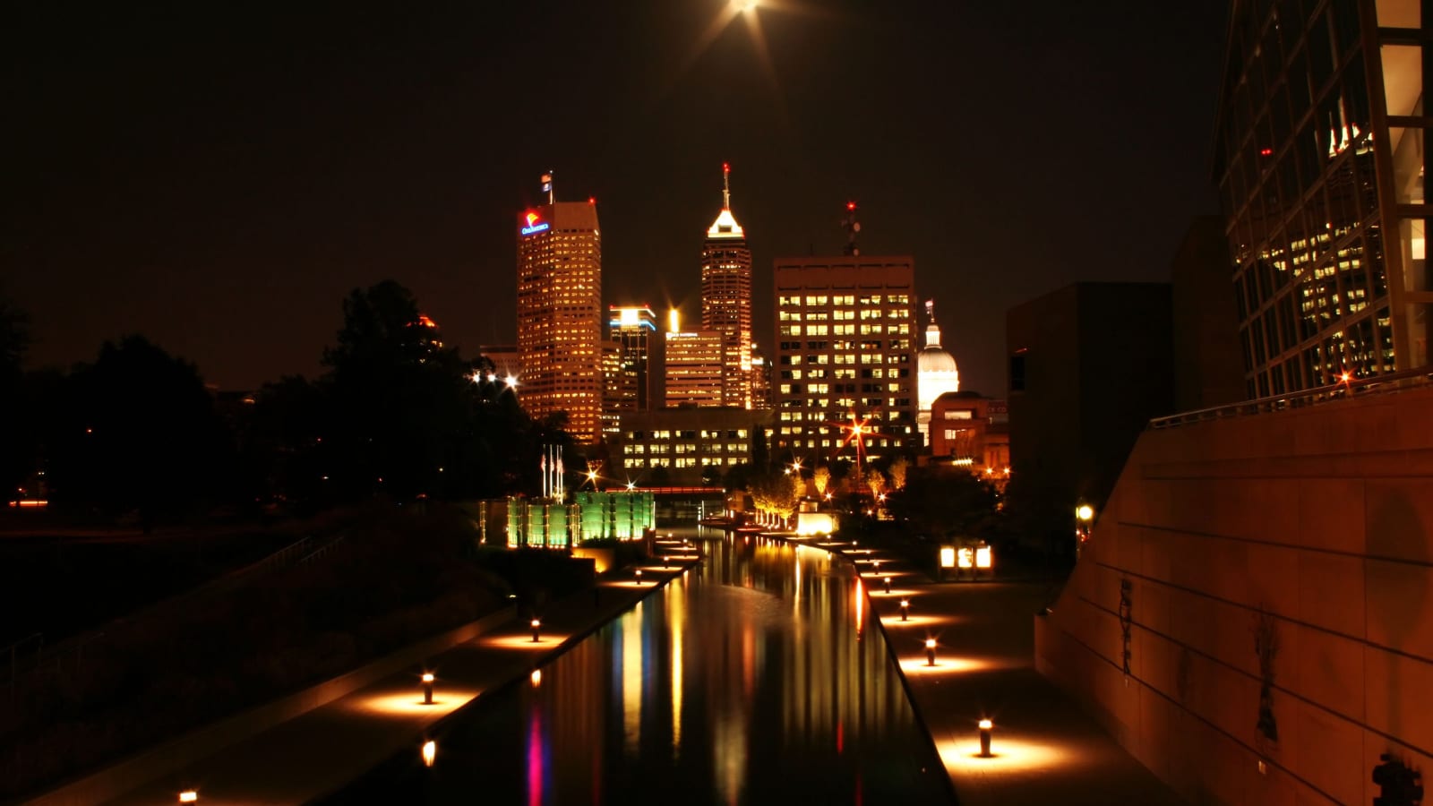 Long exposure of Indianapolis skyline at night under full moon