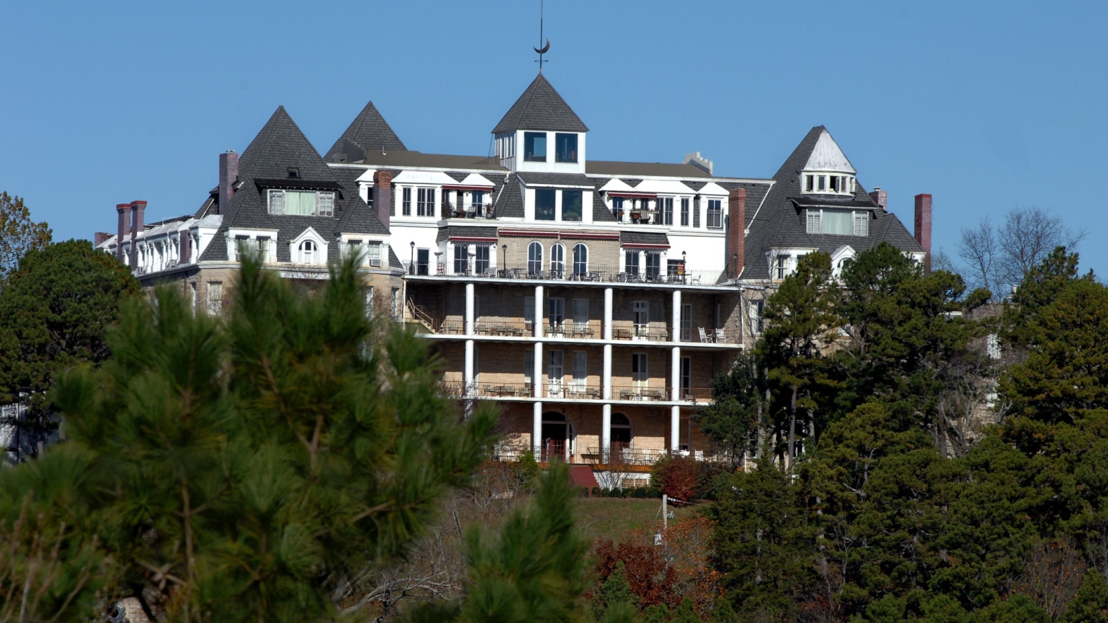 Crescent Hotel sits on top of a ridge in the Ozark Mountains in Eureka Springs, Arkansas. Built in early 1900's hotel is an historical landmark.