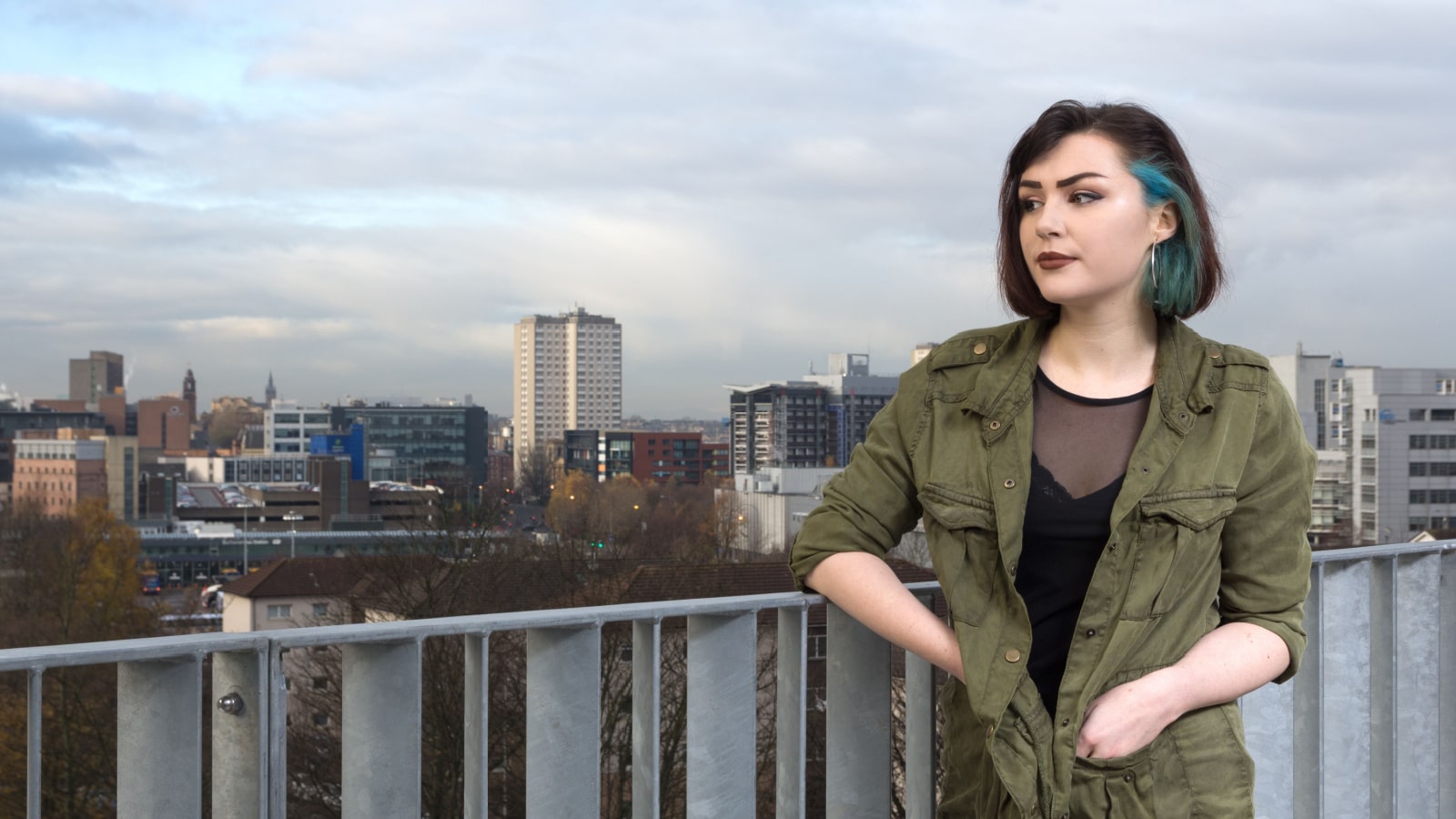 GLASGOW, SCOTLAND - DECEMBER 2, 2016: a young adult female model posing for a location fashion portrait