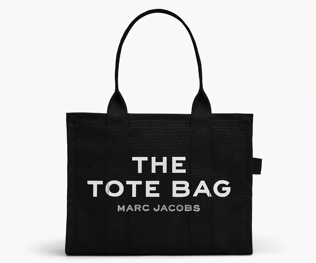 THE LARGE TOTE BAG in black by Marc Jacobs against a white background