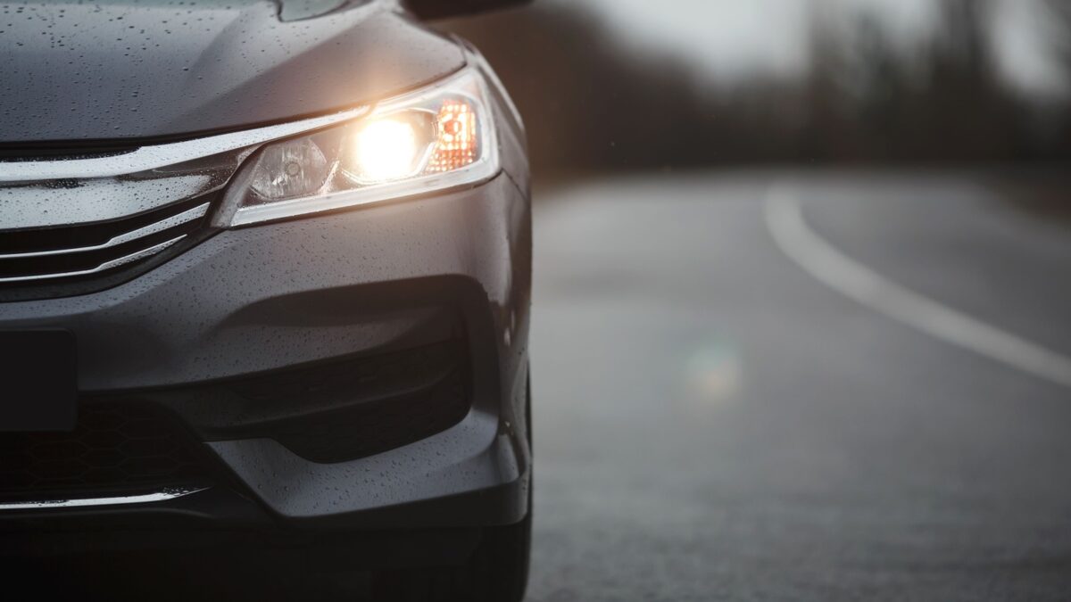 Front grill, headlights. Luxury stylish sport car banner.