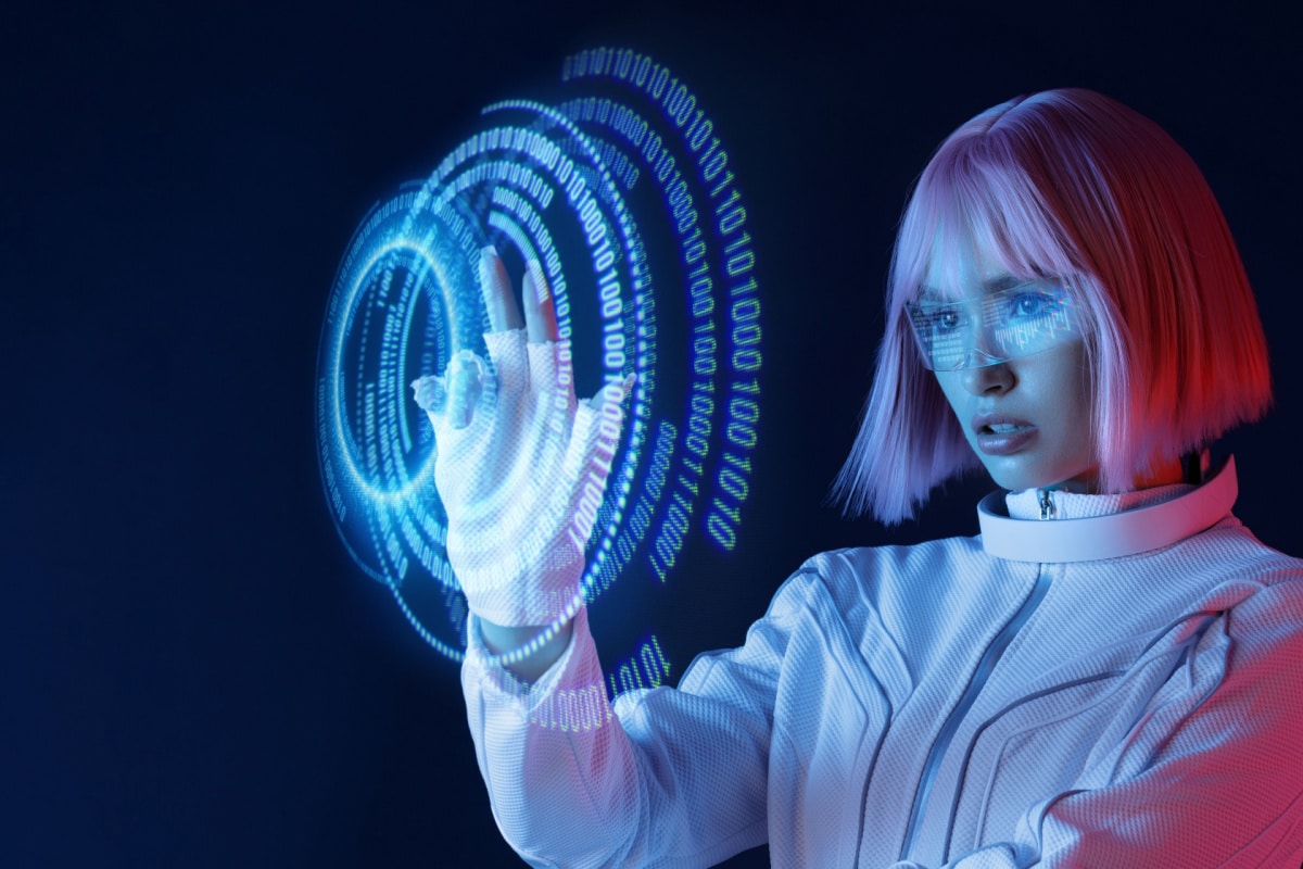 Woman in futuristic costume. Female in modern VR glasses interacting with network while having virtual reality experience. Augmented reality game, future technology, AI concept. VR. Neon blue light.