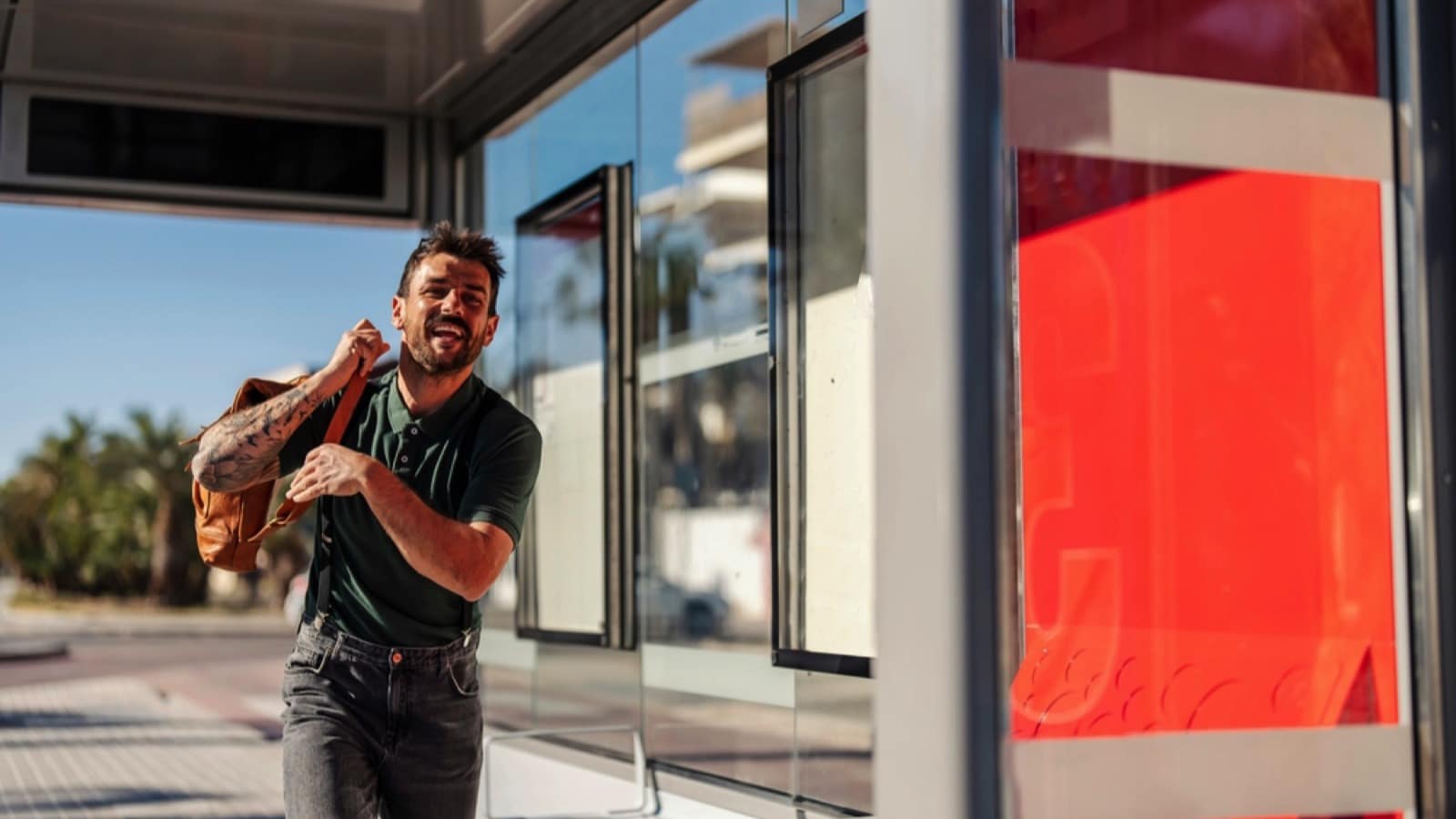 Man running to catch the bus