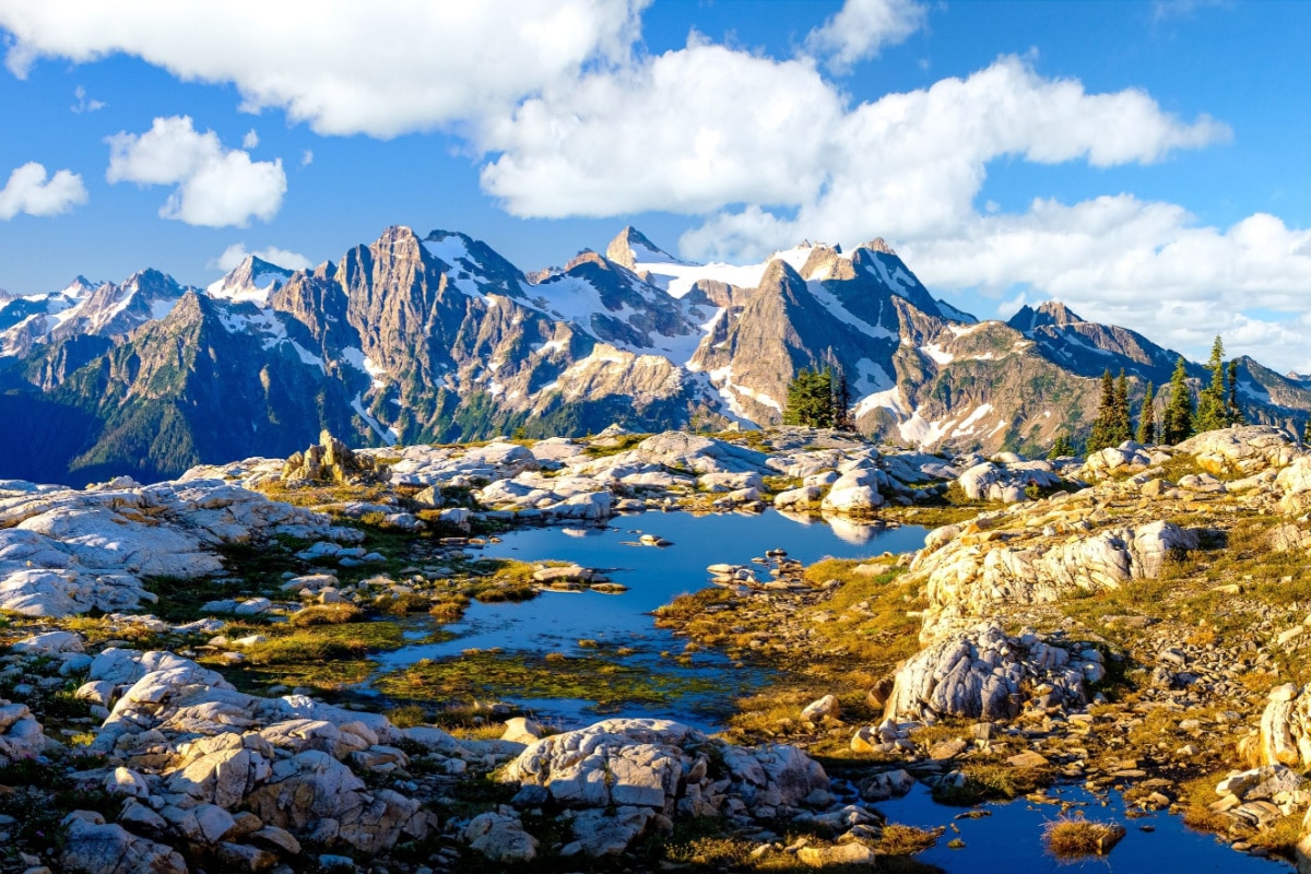 Sunrise Illuminates Beautiful Mountains and Ponds. North Cascades National Park, Washington.