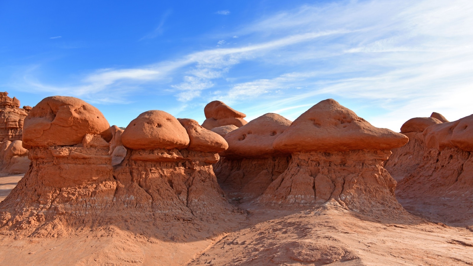 Goblin Valley Utah State Parks. Goblin Valley State Park is inhabited by strange and unique rock sculptures, carved by wind and water, that suggest mischievous goblins and phantasmagoric creatures