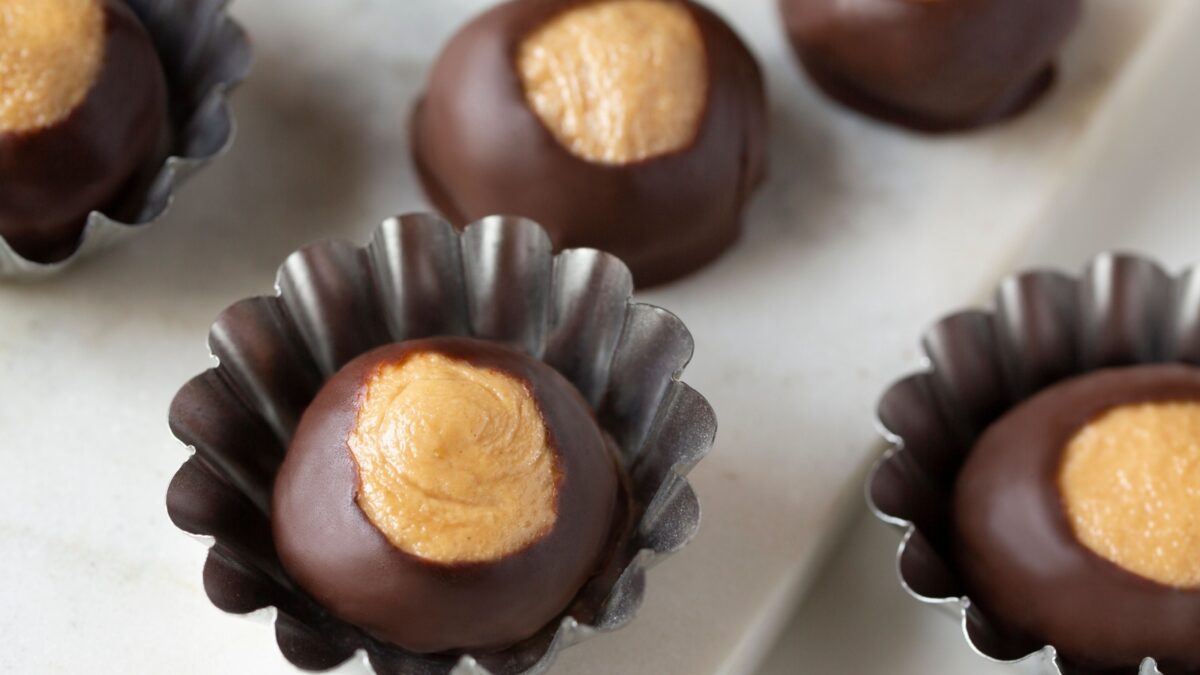 Smooth and Creamy Buckeye Chocolate and Peanut Butter Candies Chocolates on White Background