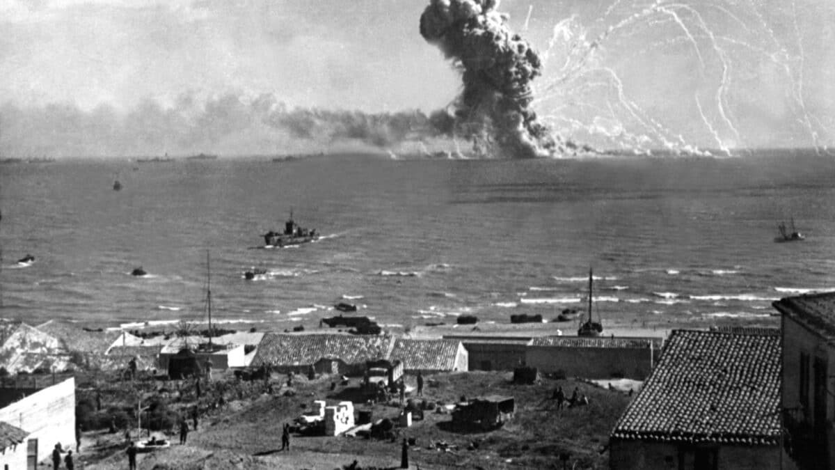 Liberty Ship SS Rowan explodes after being hit by a German bomb, near Gela, Sicily on July 11, 1943. July 11, 1943, Allied invasion of Sicily, World War 2.