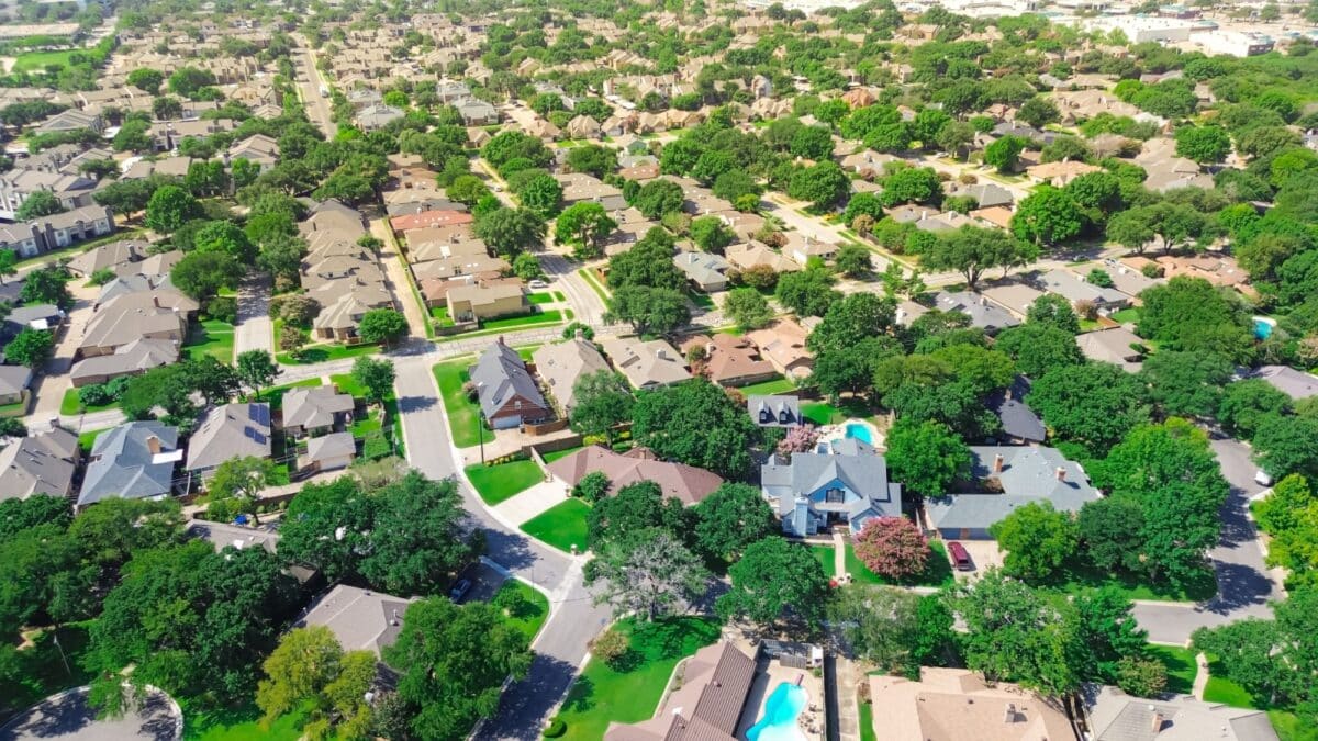 Sustainable urban planning residential neighborhood green community in North Arlington, Texas, open space reserve, road verges, lush green trees cover