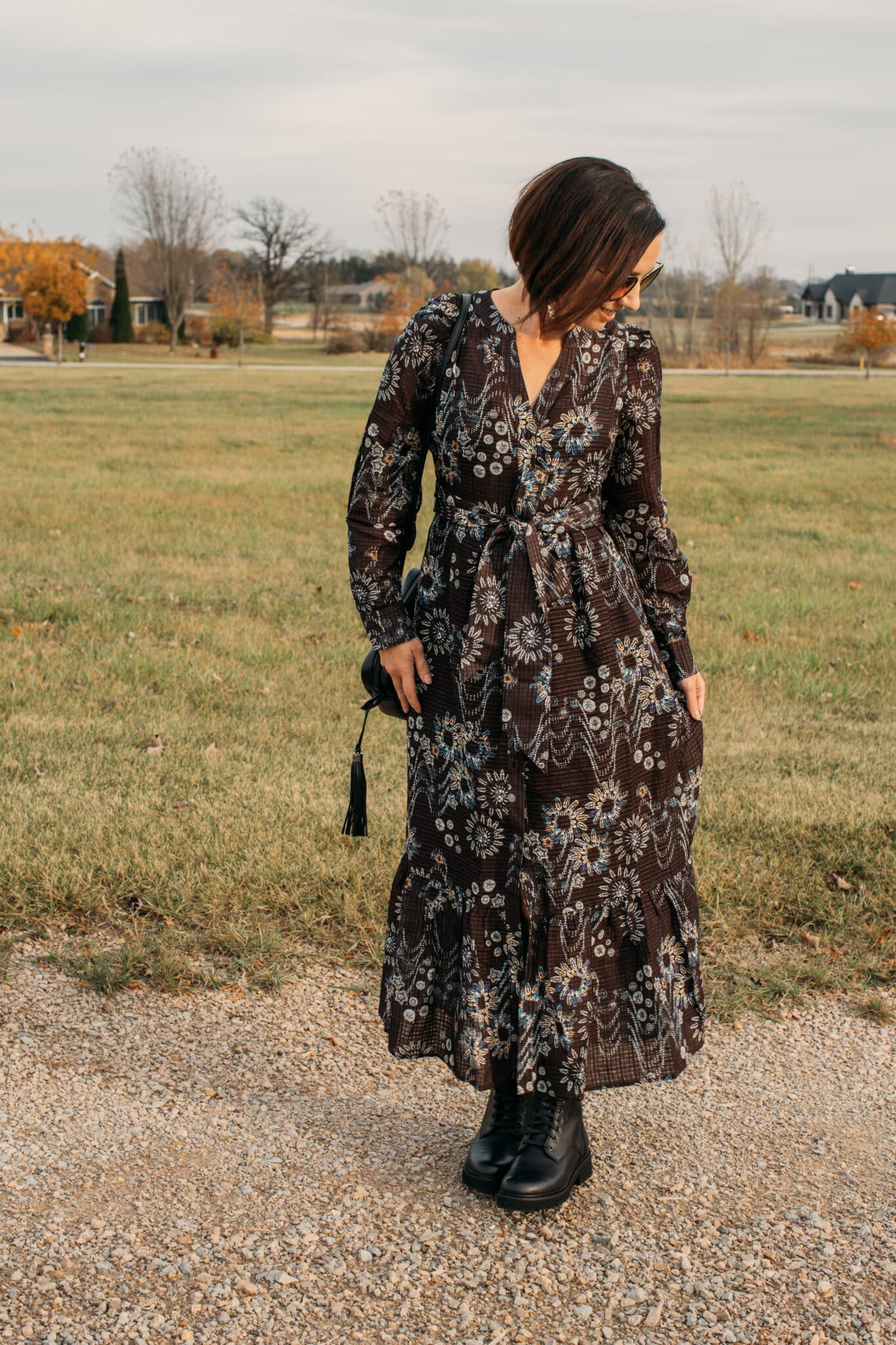 Lindsey wearing a maxi dress from Marie Oliver on a sunny fall day.